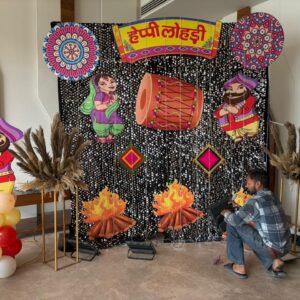 Lohri Theme Decoration with Punjabi Folk Backdrop & Sequin Setup